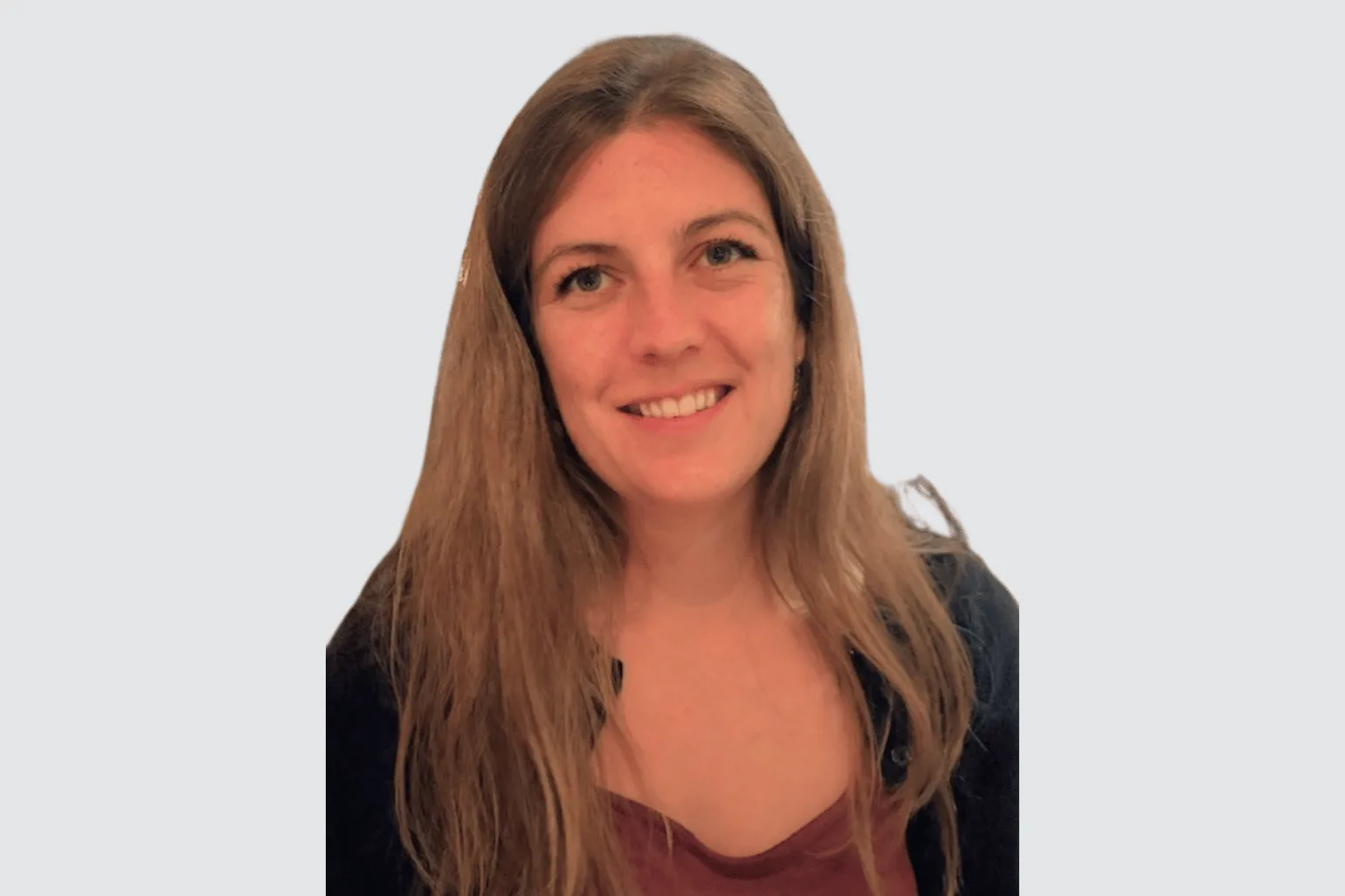 Sarah Robertson, Clinical Psychologist wearing a black jumper and rouge top